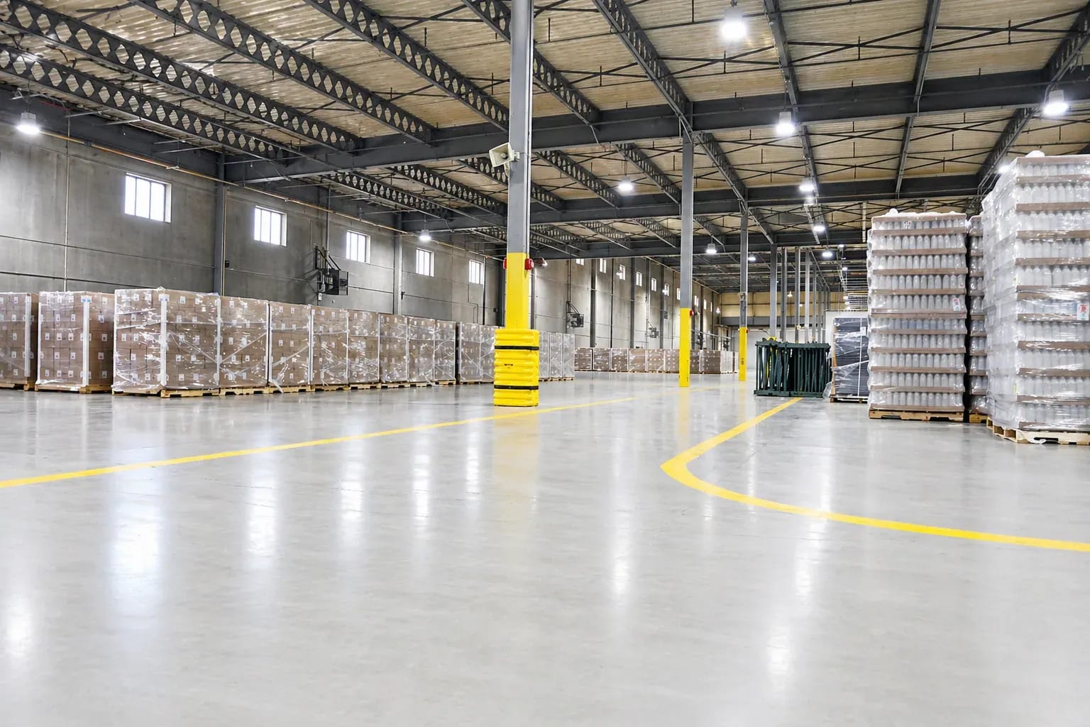 Palletised finished goods on the Ally Labs production floor.